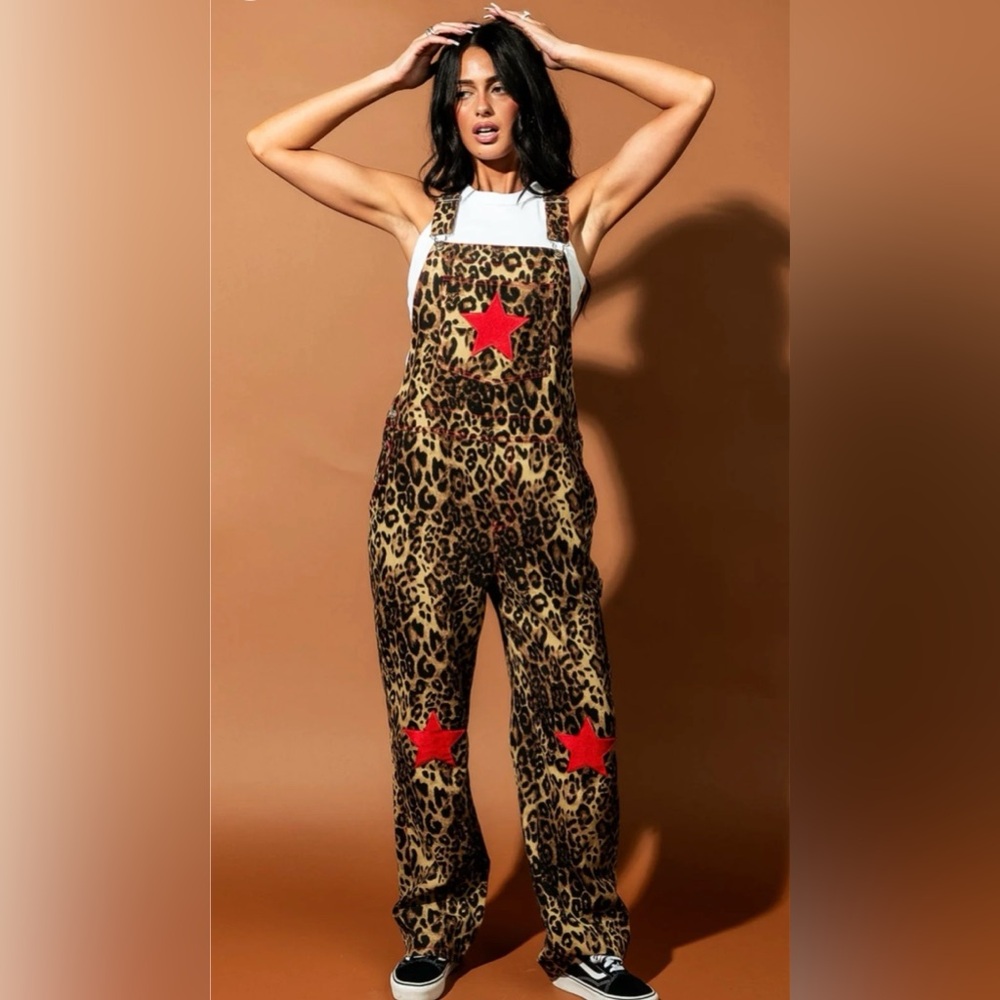 Dressed in LALA Leopard Jumpsuit with Red Stars